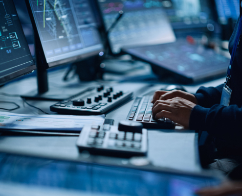 Close Up Of A Professional Office Specialist Working On Desktop Computer